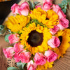 Bouquet girasoles y mini rosas fucsia